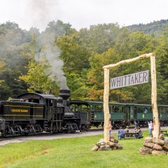 a steam train on a steel track