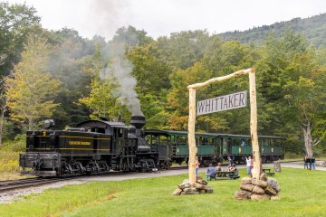 a steam train on a steel track